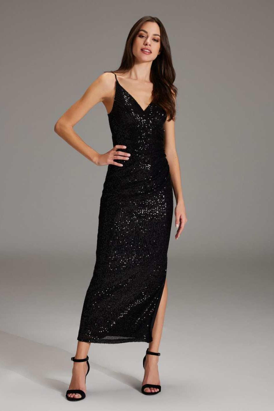 Abendkleid aus elastischer Paillette mit Spagetti Trägern und seitlichem Schlitz