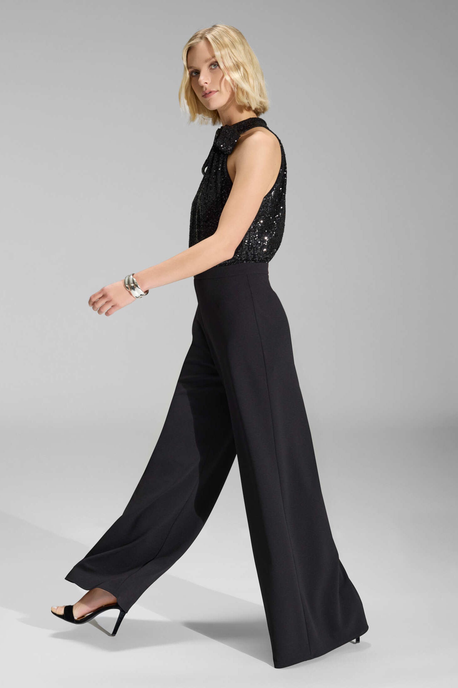 Ärmelloser Jumpsuit mit Schluppenblusen Top aus elastischer Paillette