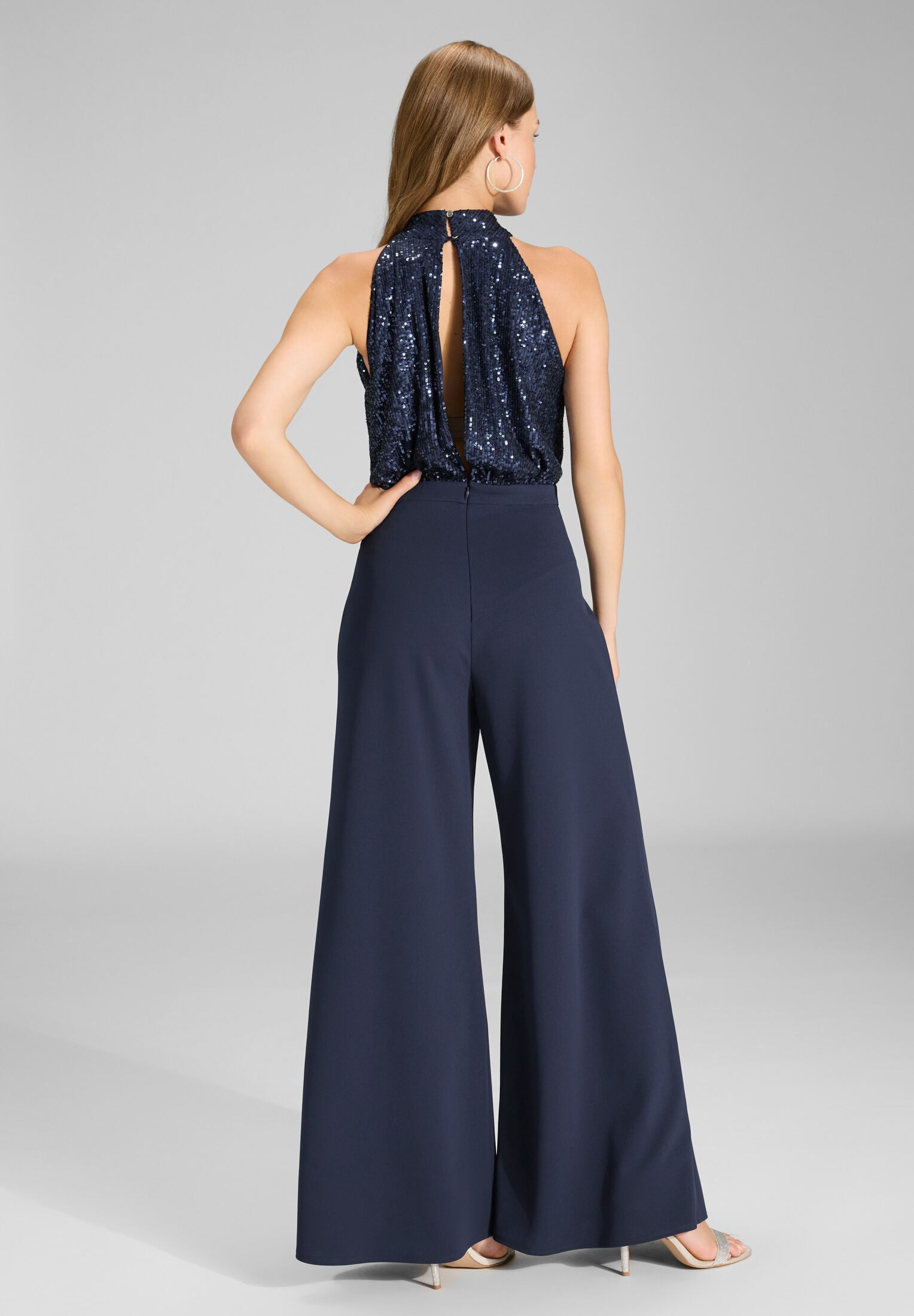 Ärmelloser Jumpsuit mit Schluppenblusen Top aus elastischer Paillette