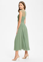 Cocktailkleid aus Mesh mit geraffter Korsage