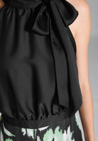 Jumpsuit mit Schluppenblusen Top und Druck Hose