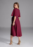 Chiffon Kleid in Wickel Optik mit Vokuhila Saum