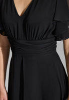 Chiffon Jumpsuit mit Überrock und Volantärmeln