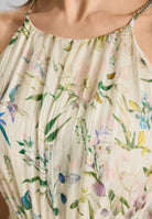 Abendkleid aus bedrucktem Chiffon mit Glitzerstreifen und Zierträgern